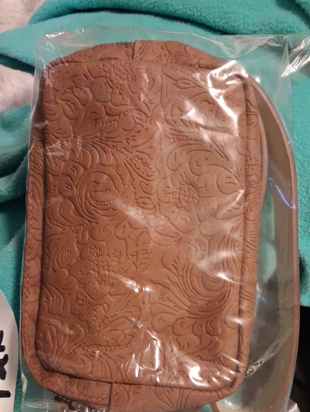 Embossed Floral Tan Wristlet Pouch